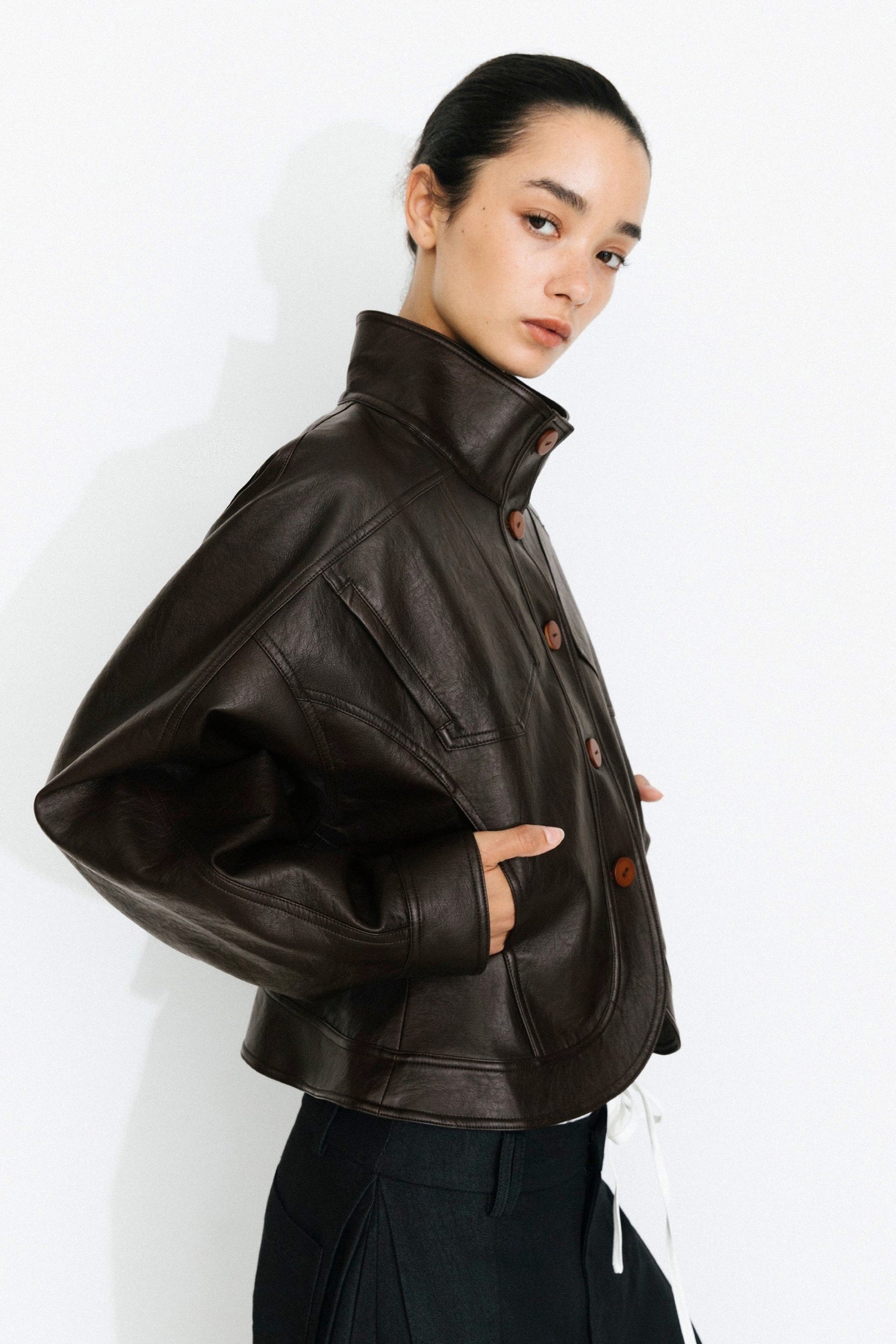 Curved Sleeved Faux Leather Jacket