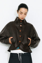 Curved Sleeved Faux Leather Jacket