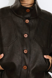 Curved Sleeved Faux Leather Jacket