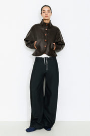 Curved Sleeved Faux Leather Jacket