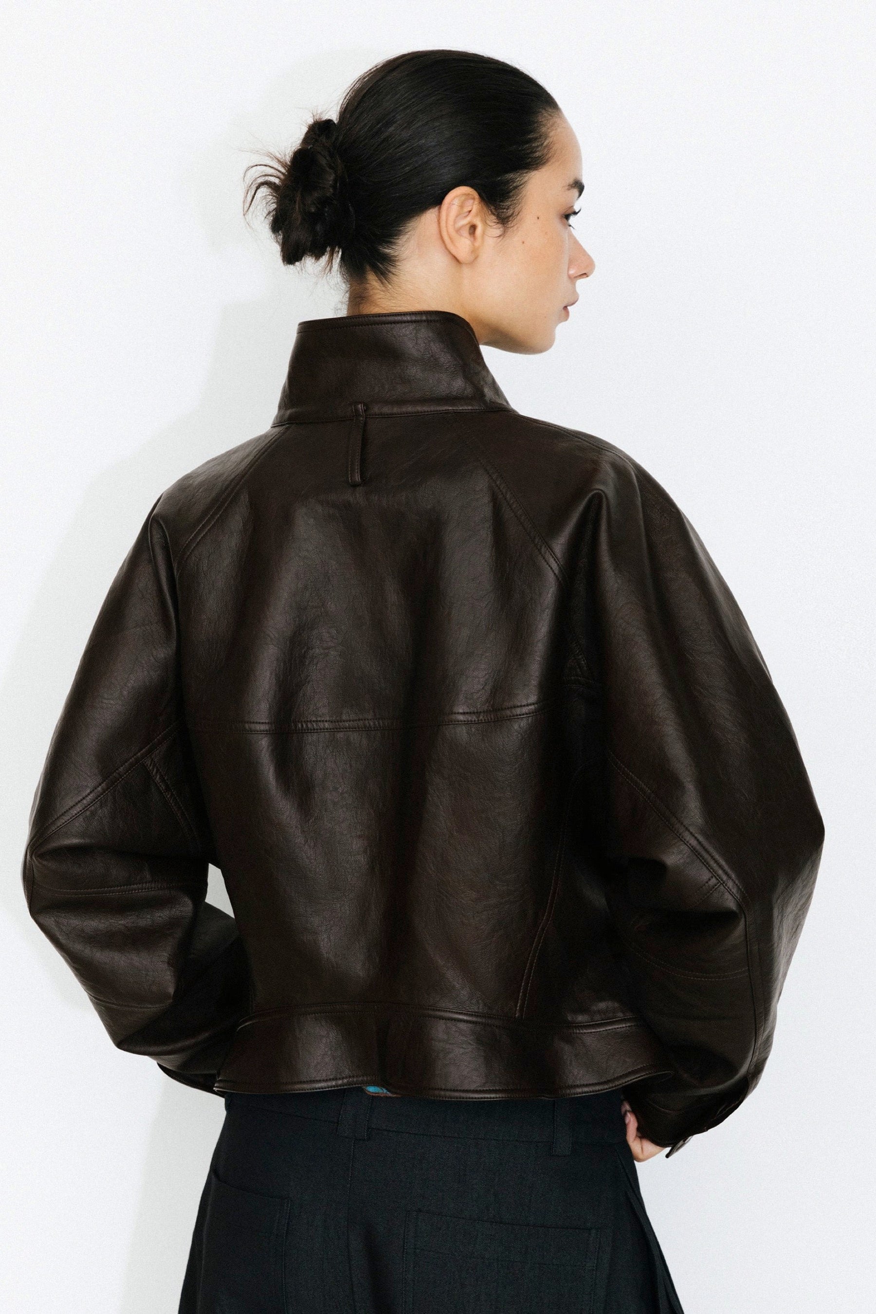 Curved Sleeved Faux Leather Jacket
