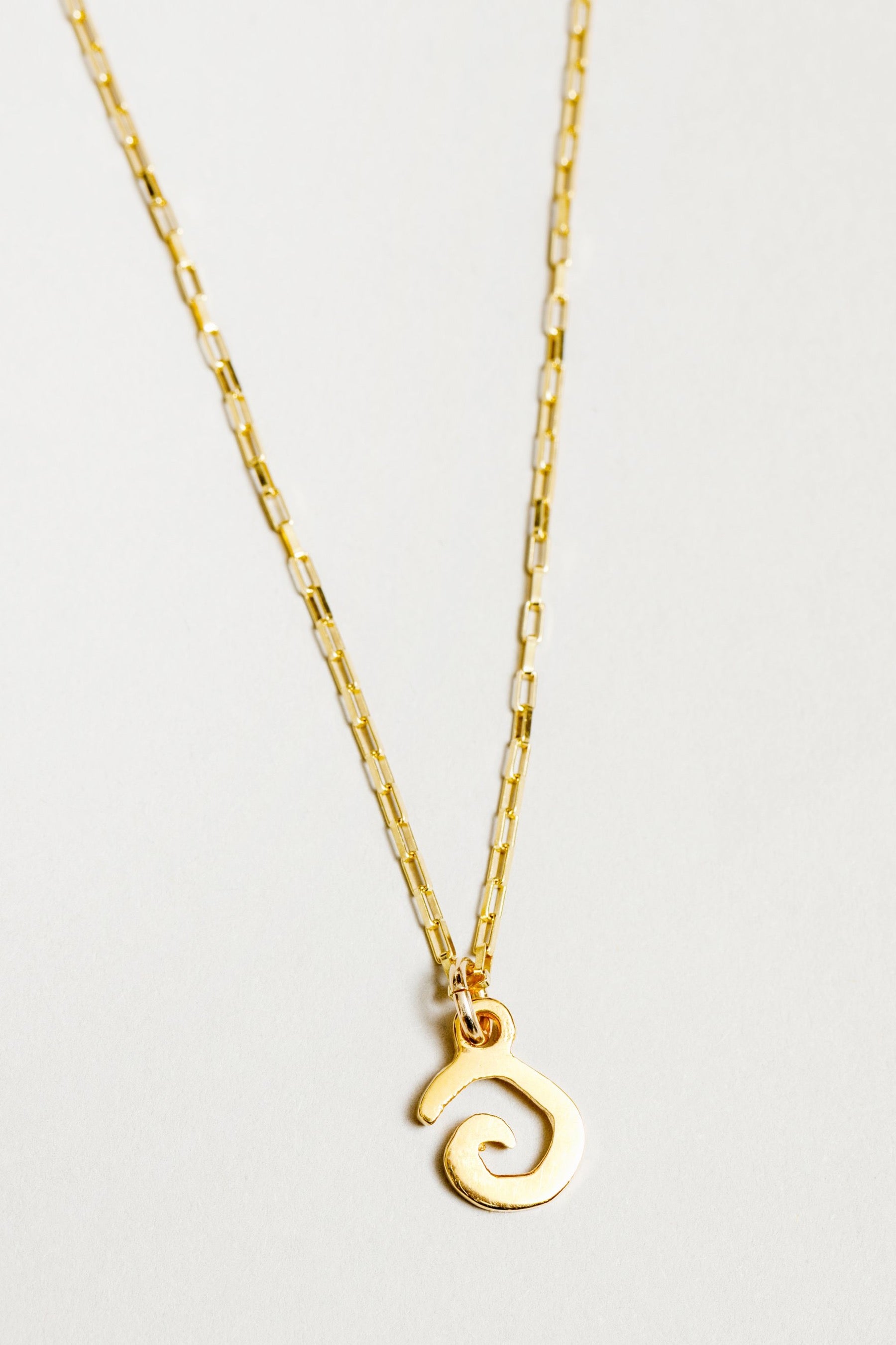 Gold Charm Swirl Necklace