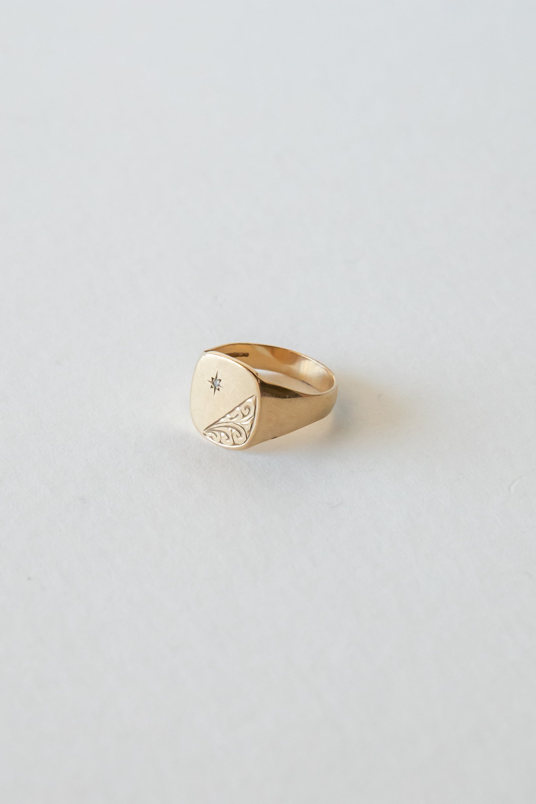 1975 Swirl Star Signet Ring