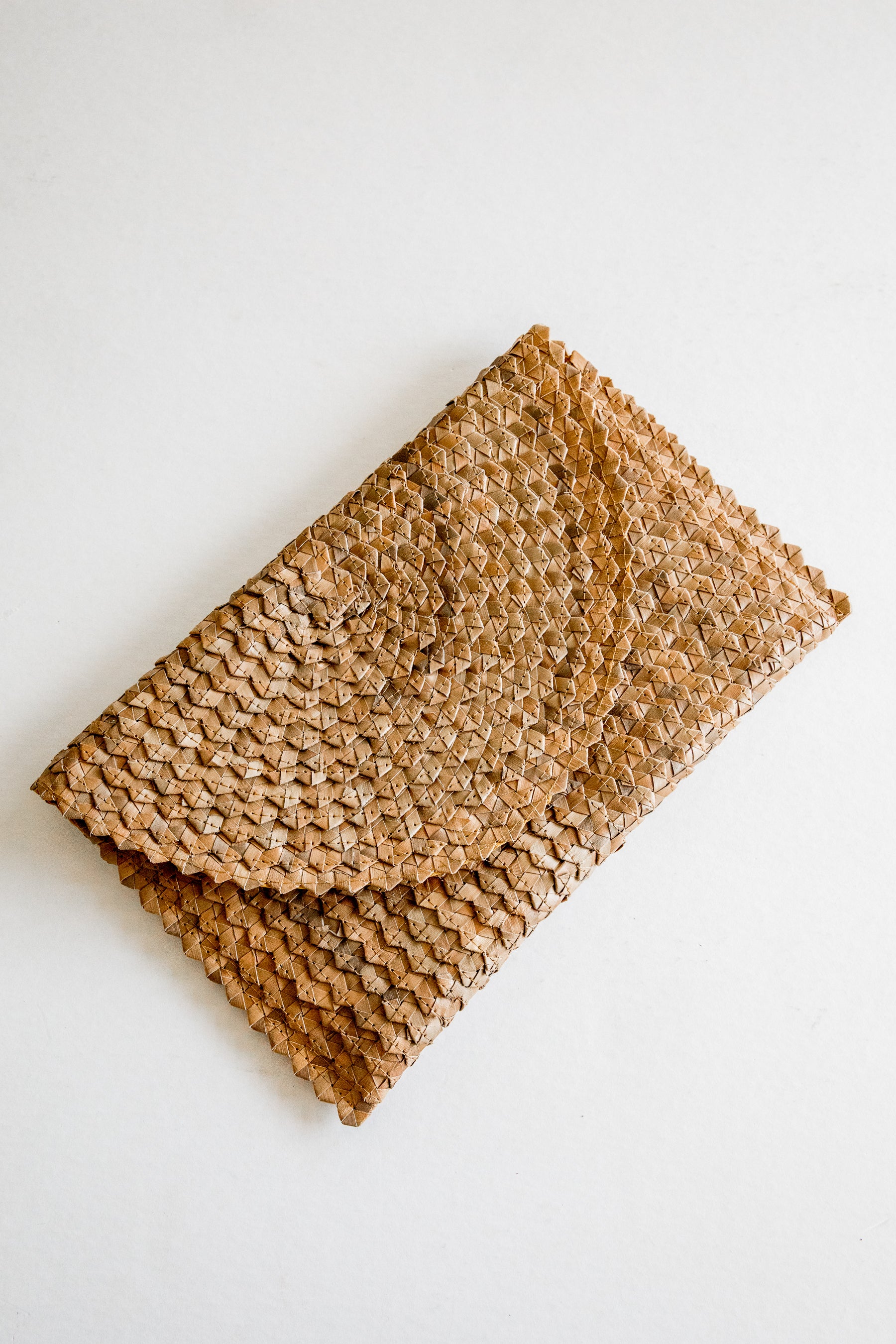 Amber Herringbone Rattan Clutch